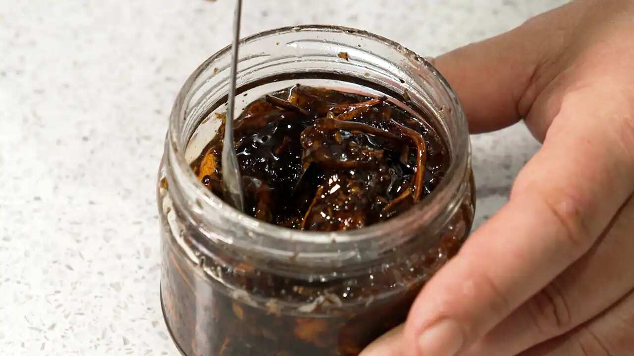 A jar of magic mushrooms preserved in honey.
