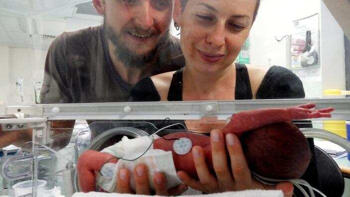 Volodymyr Muliar and Yaryna Kvitka with baby Marko, who was born at just 28 weeks