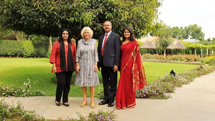 Camilla, Duchess of Cornwall, with Dr Mathai and his team at their wellness centre in India