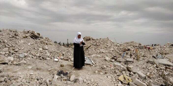 Woman in Mosul searches for hope in remains of what used to be her home
