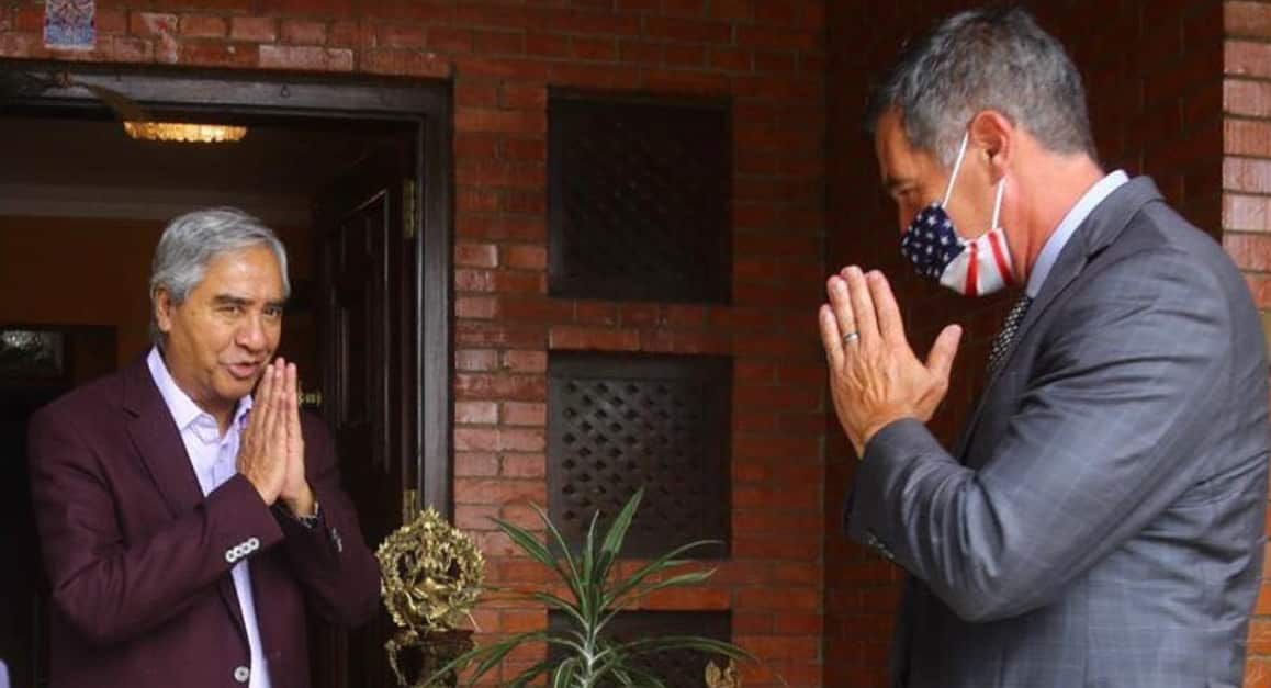 Nepal Prime Minister Sher Bahadur Deuba meeting Randy Berry, the US Ambassador to Nepal (right) in Kathmandu