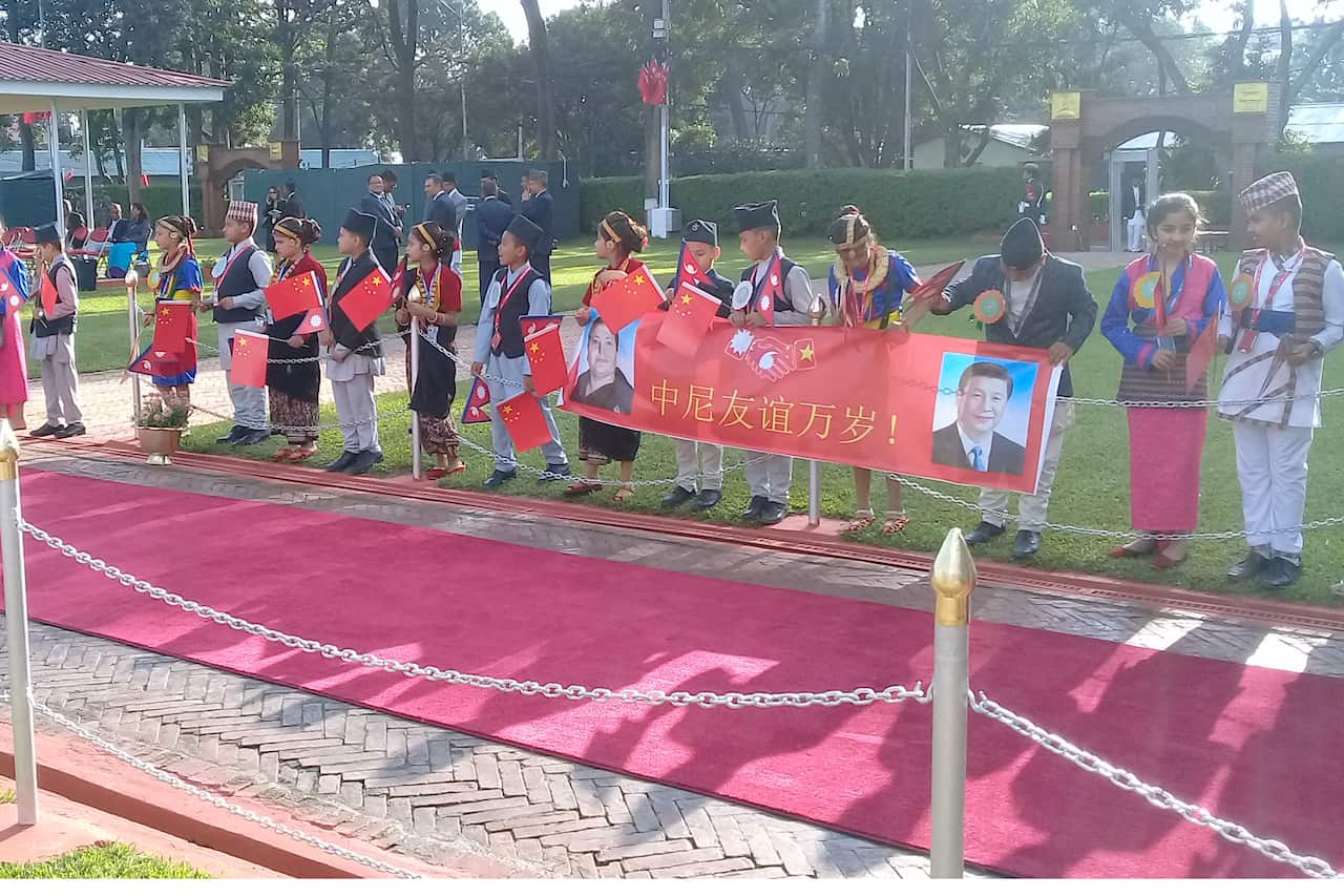 Nepali children welcoming China's President Xi Jinping at Kathmandu airport