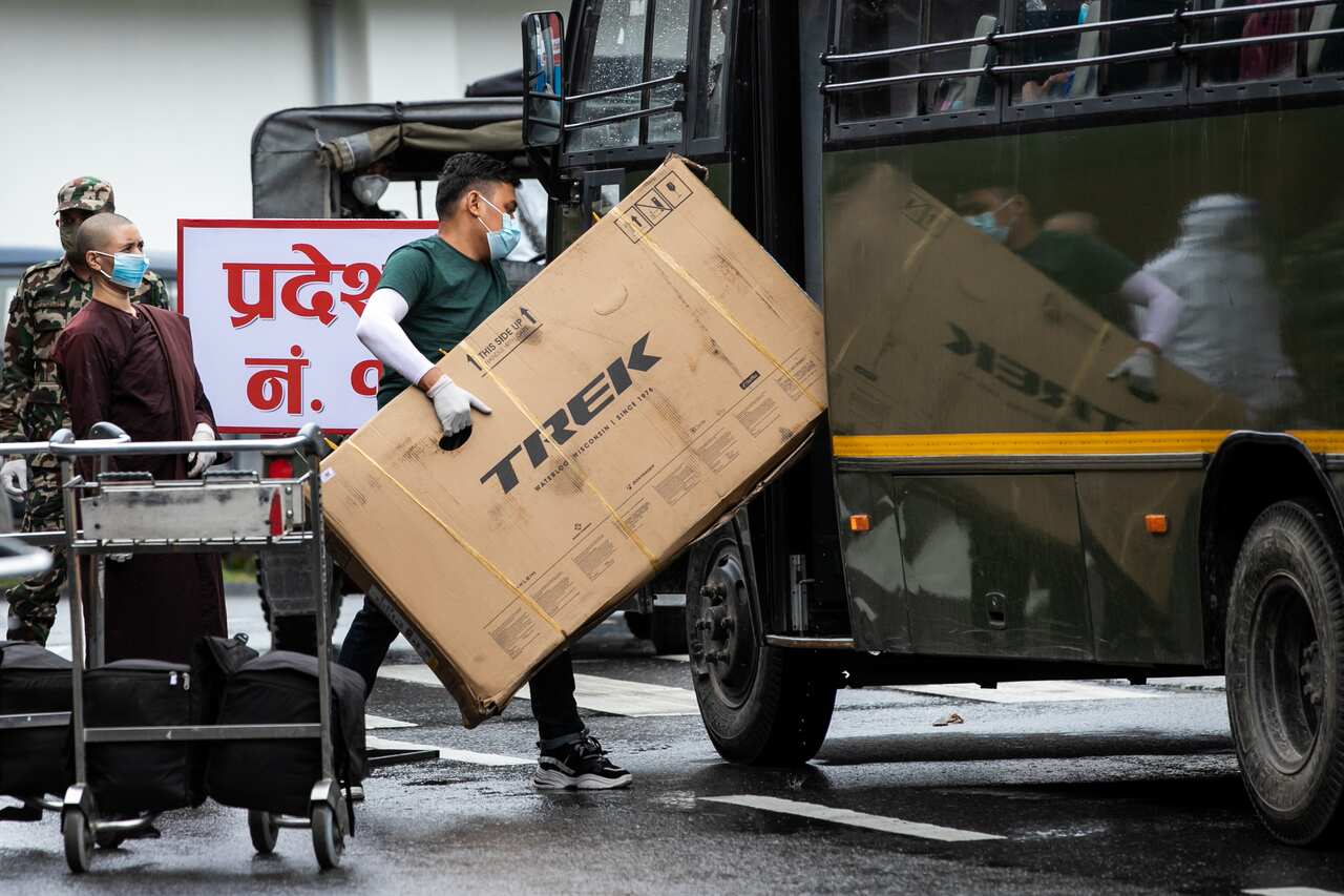 Nepali citizens repatriated from Myanmar after coronavirus pandemic arrive in Kathmandu's international airport
