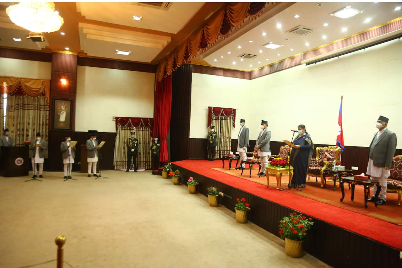 New Nepal Ministers taking oath of office after Prime Minister KP Sharma Oli reshuffled his cabinet