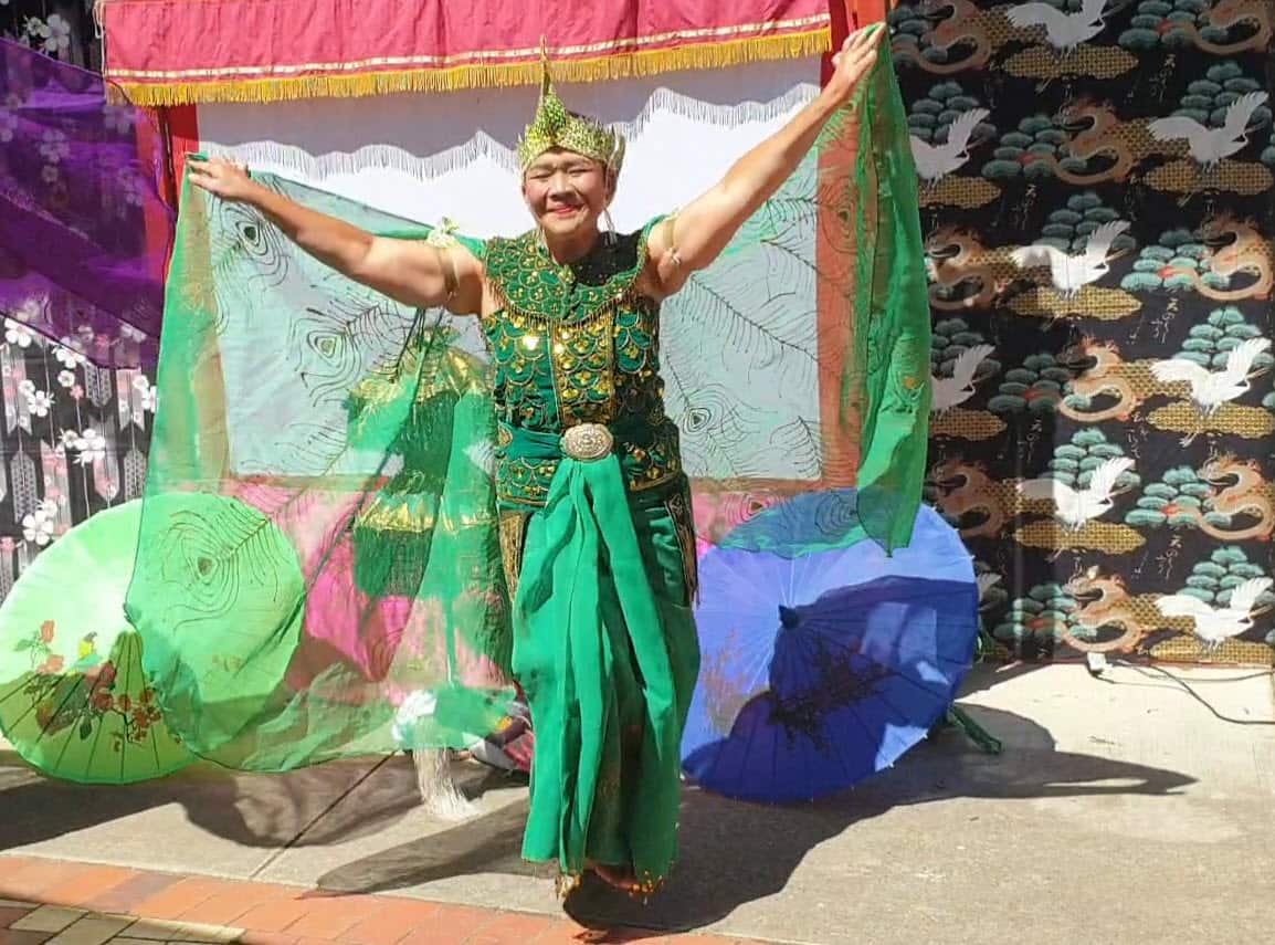 Nita performing in traditional costume