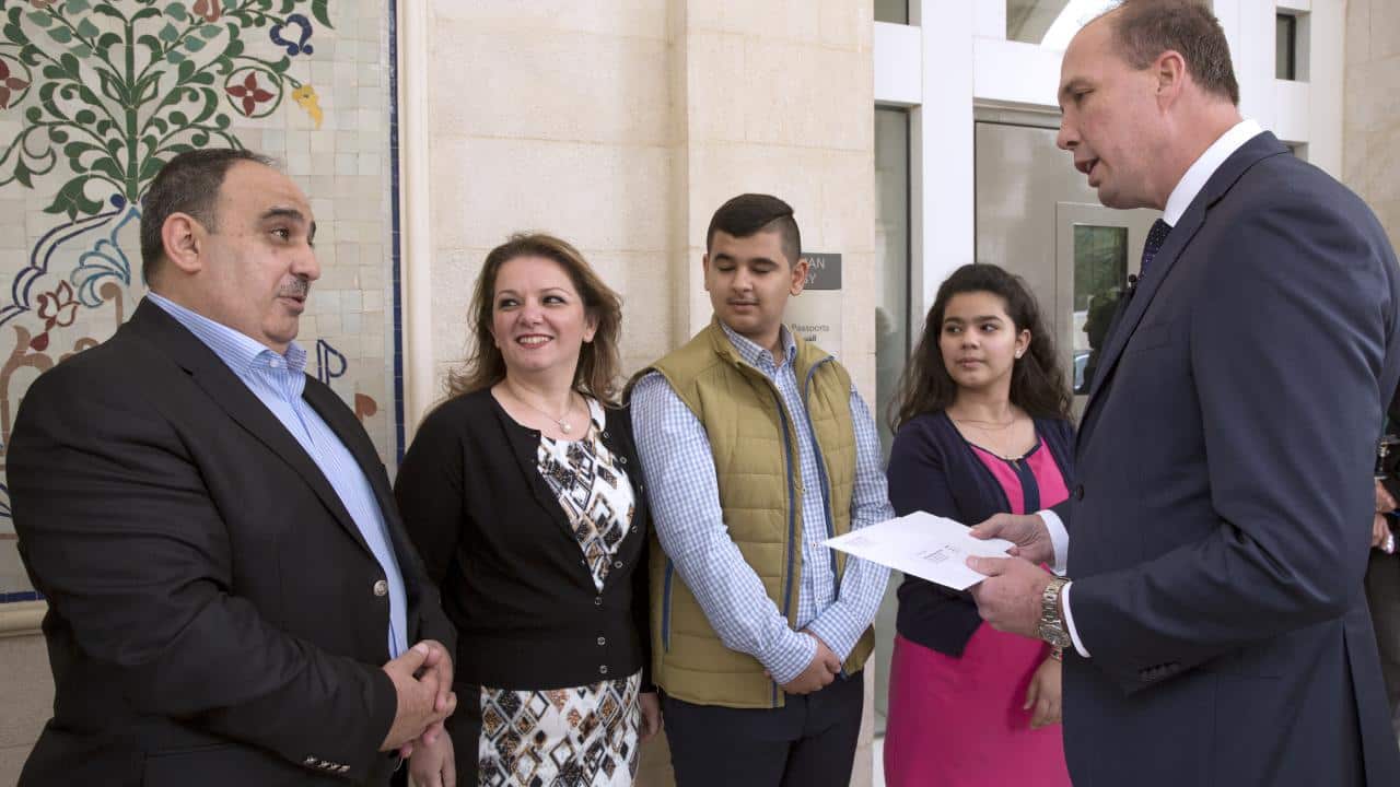 Ossama Butti with his family meeting minister Peter Dutton