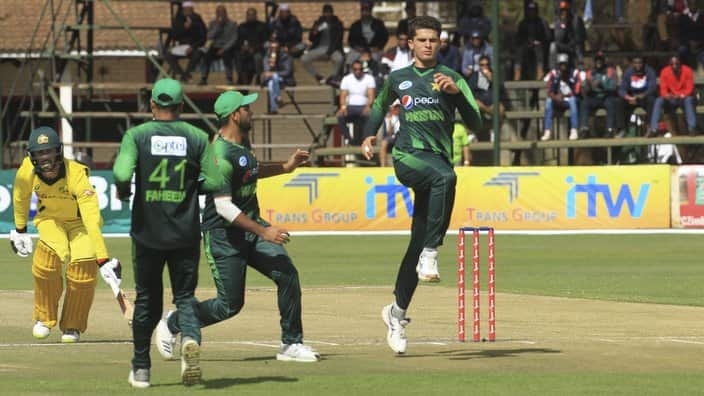 Australia's Glenn Maxwell, left, avoids a run out, on the final day of the T20 cricket match between Australia and Pakistan at the Harare Sports Club, in Harare, Sunday, July 8, 2018. (AP Photo/Tsvangirayi Mukwazhi)