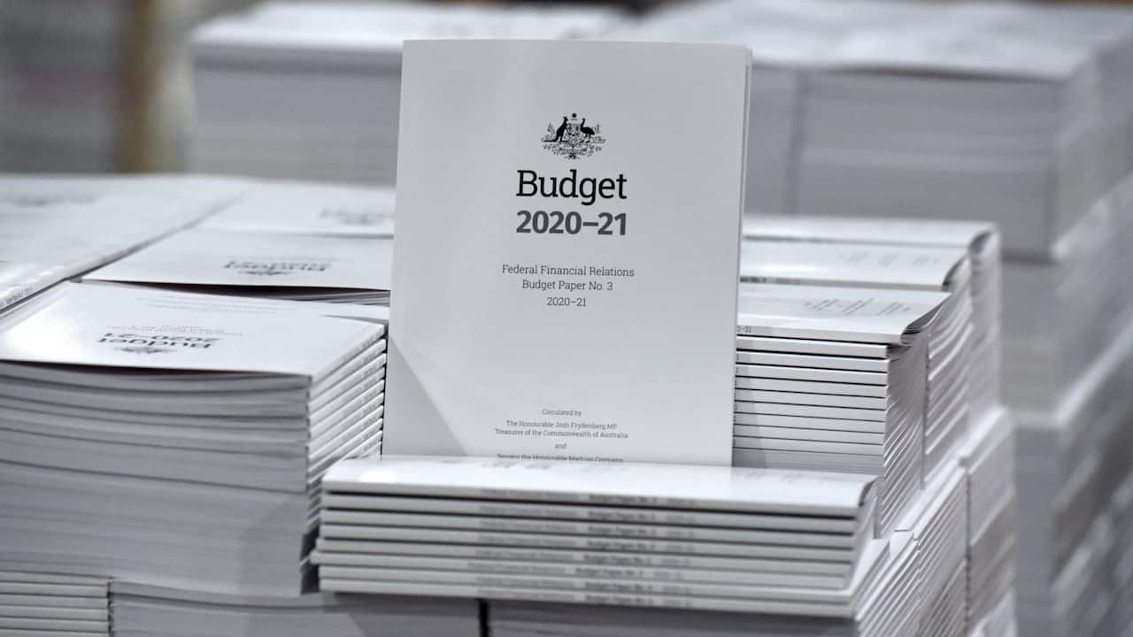 The 2020-2021 Budget Papers are seen at a printing facility prior to being delivered to Parliament House