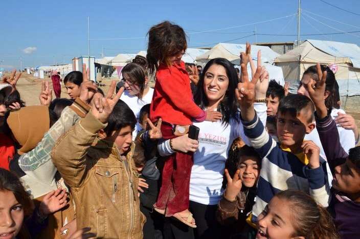Pari Ibrahim with children in Khanke IDP Camp, Duhok