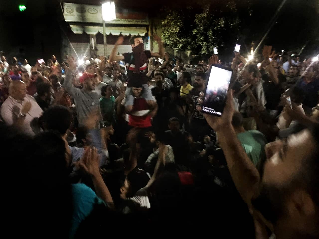 Protesters chant slogans against the regime in Cairo, Egypt, early Saturday, Sept. 21, 2019. 
