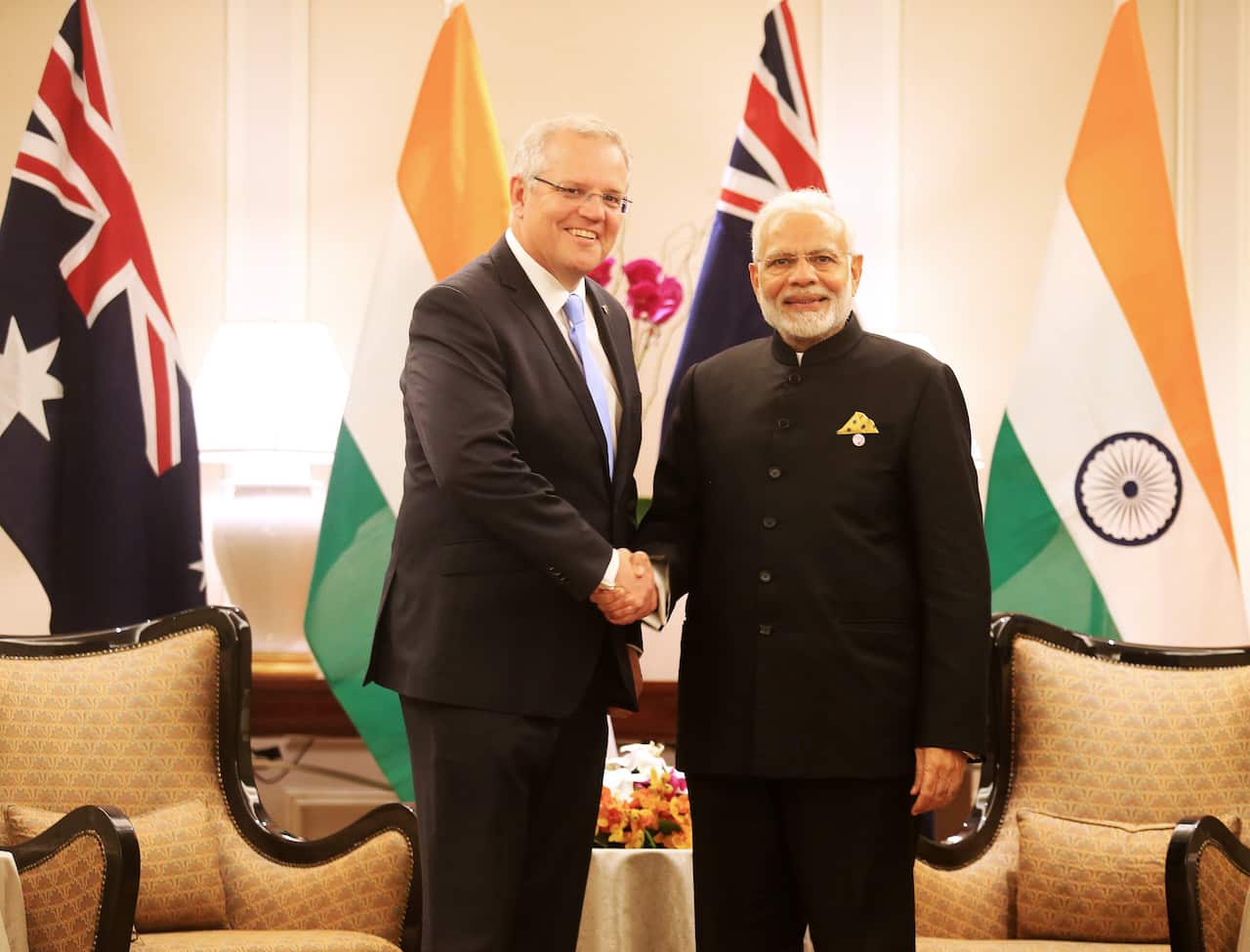 Australian Prime Minister Scott Morrison (L) met Indian Prime Minister Narendra Modi (R) at Singapore.