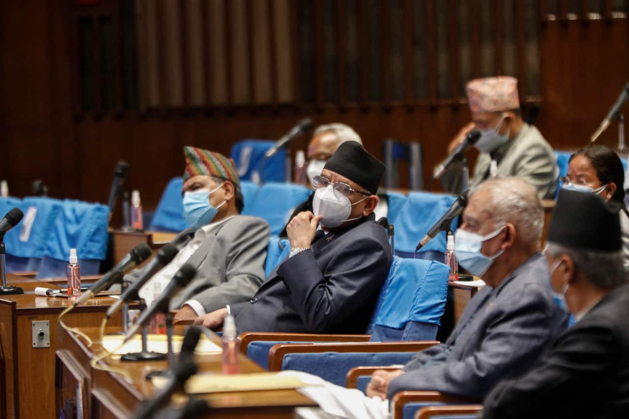, Monday, May 10, 2021. Nepal's prime minister seeks a vote of confidence in parliament in an attempt to prove he still has enough support to continue in power as he faces a second split within his ruling party.(AP Photo/Niranjan Shrestha)