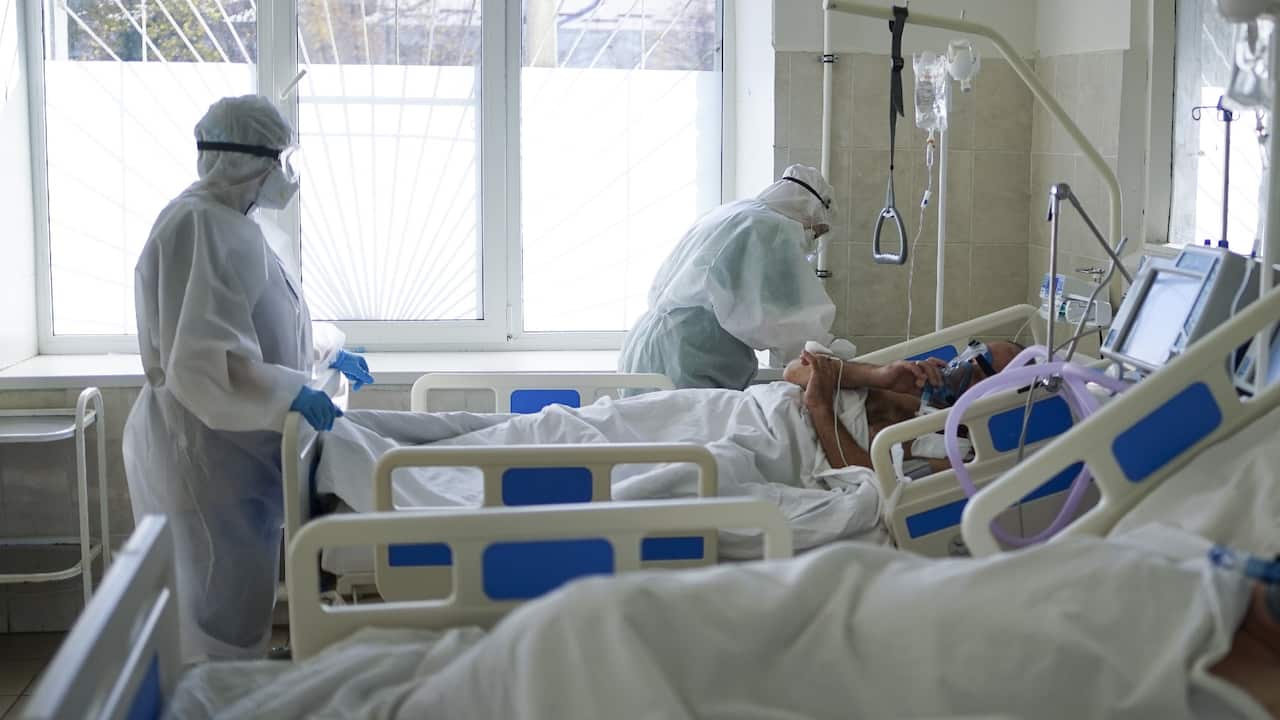 Medical workers treat patients at a COVID-19 facility of the Emergency Care Hospital of the Healthcare Ministry of the Republic of Chuvashia.