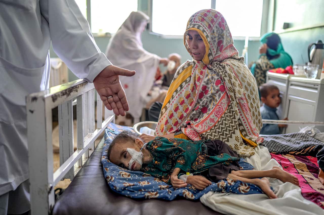 A child suffering from malnutrition receives treatment at the Mirwais hospital in Kandahar.