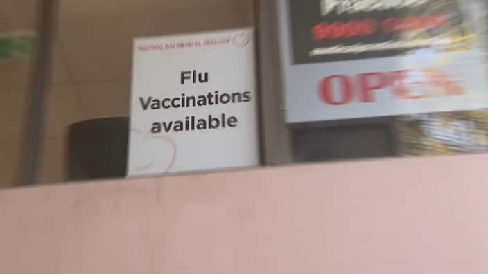 A flu vaccination sign at a Sydney medical practice 