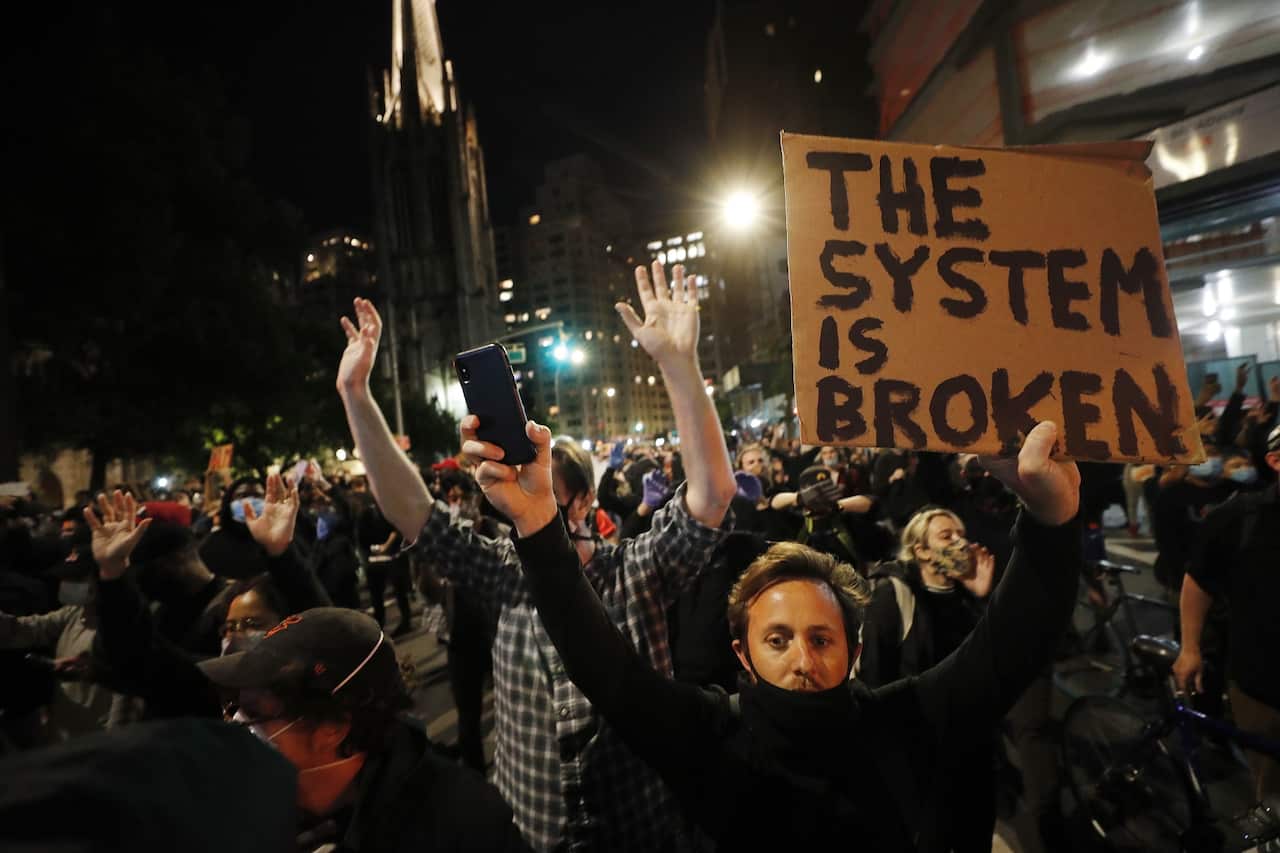 Protesters face off with New York City Police during a demonstration about the arrest of George Floyd