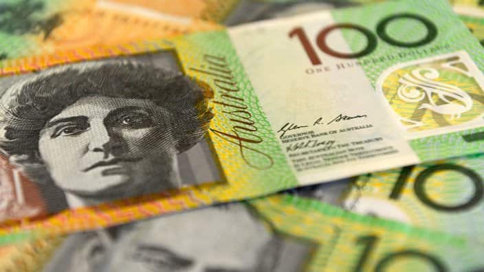 $100 Australian dollar notes, pictured in Brisbane, Tuesday, Aug. 20, 2013. (AAP Image/Dan Peled) NO ARCHIVING