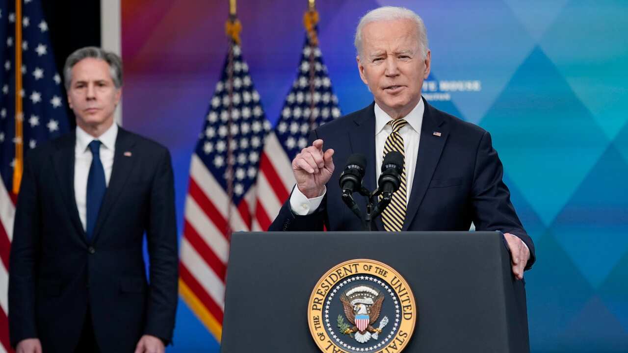 President Joe Biden speaks about additional security assistance that his administration will provide to Ukraine in the South Court Auditorium on the White House campus in Washington, Wednesday, March 16, 2022. Secretary of State Antony Blinken stands at l