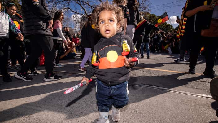 Brian Liddle Jr participates in a NAIDOC week march in Melbourne in 2018 