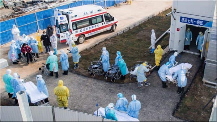 Patients back in Wuhan transferred to newly-built hospital