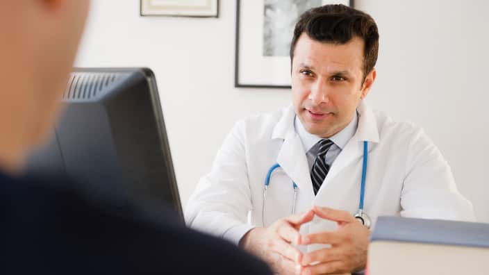 Doctor talking to patient
