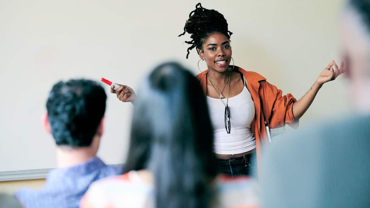Woman teaching in class