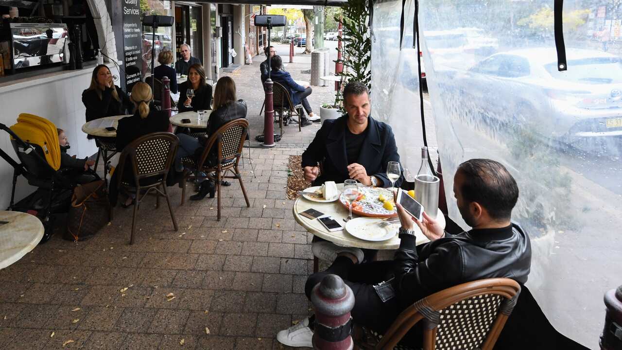 Customers of Piato restaurant in the suburb of North Sydney sit outside having lunch