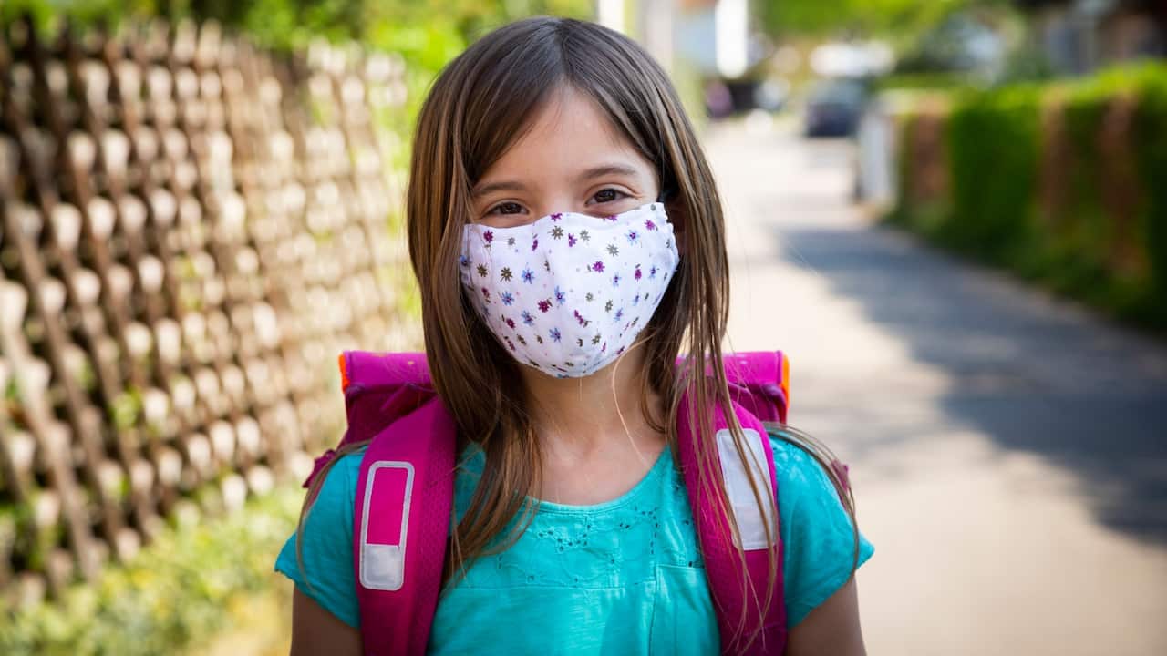 Schoolgirl in mask