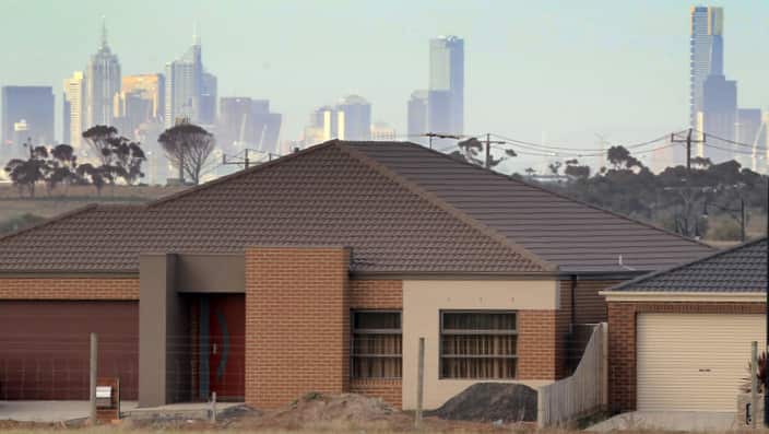 The Melbourne city skyline is seen behind a new home at a housing estate at Deer Park in the outer western suburbs of Melbourne, Wednesday, May 23, 2012. (AAP Image/David Crosling) NO ARCHIVING
