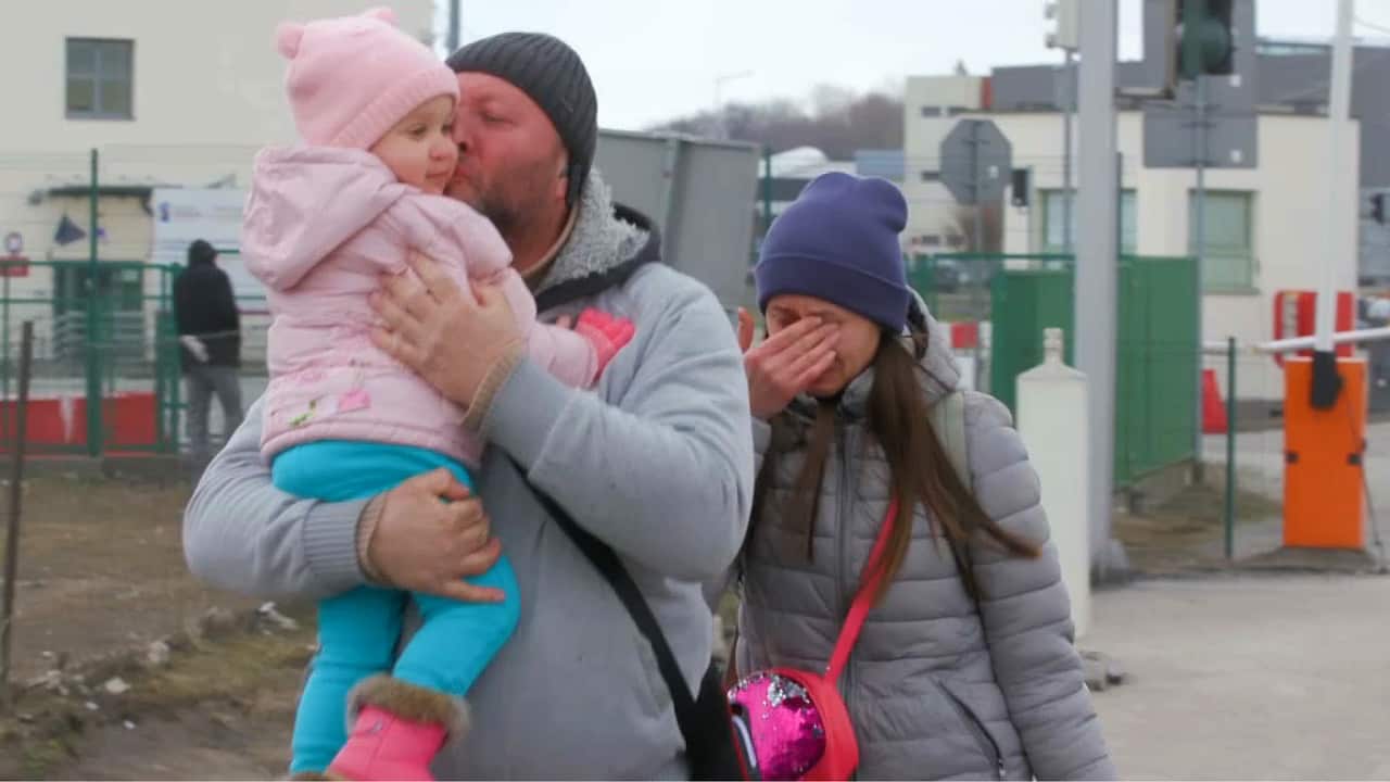 Men - who have to return to Ukraine - must leave their families at the Polish border