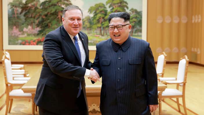 U.S. Secretary of State Mike Pompeo, left, shakes hands with North Korean leader Kim Jong Un during a meeting in Korea headquarters in Pyongyang, North Korea. 