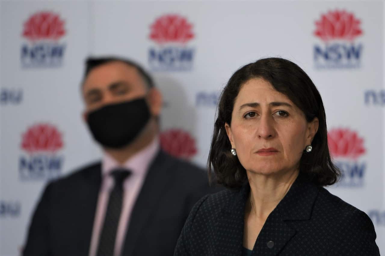 NSW Premier Gladys Berejiklian and Deputy Premier John Barilaro speak to the media during a press conference in Sydney, Friday, August 3, 2021. (AAP Image/Dean Lewins) NO ARCHIVING