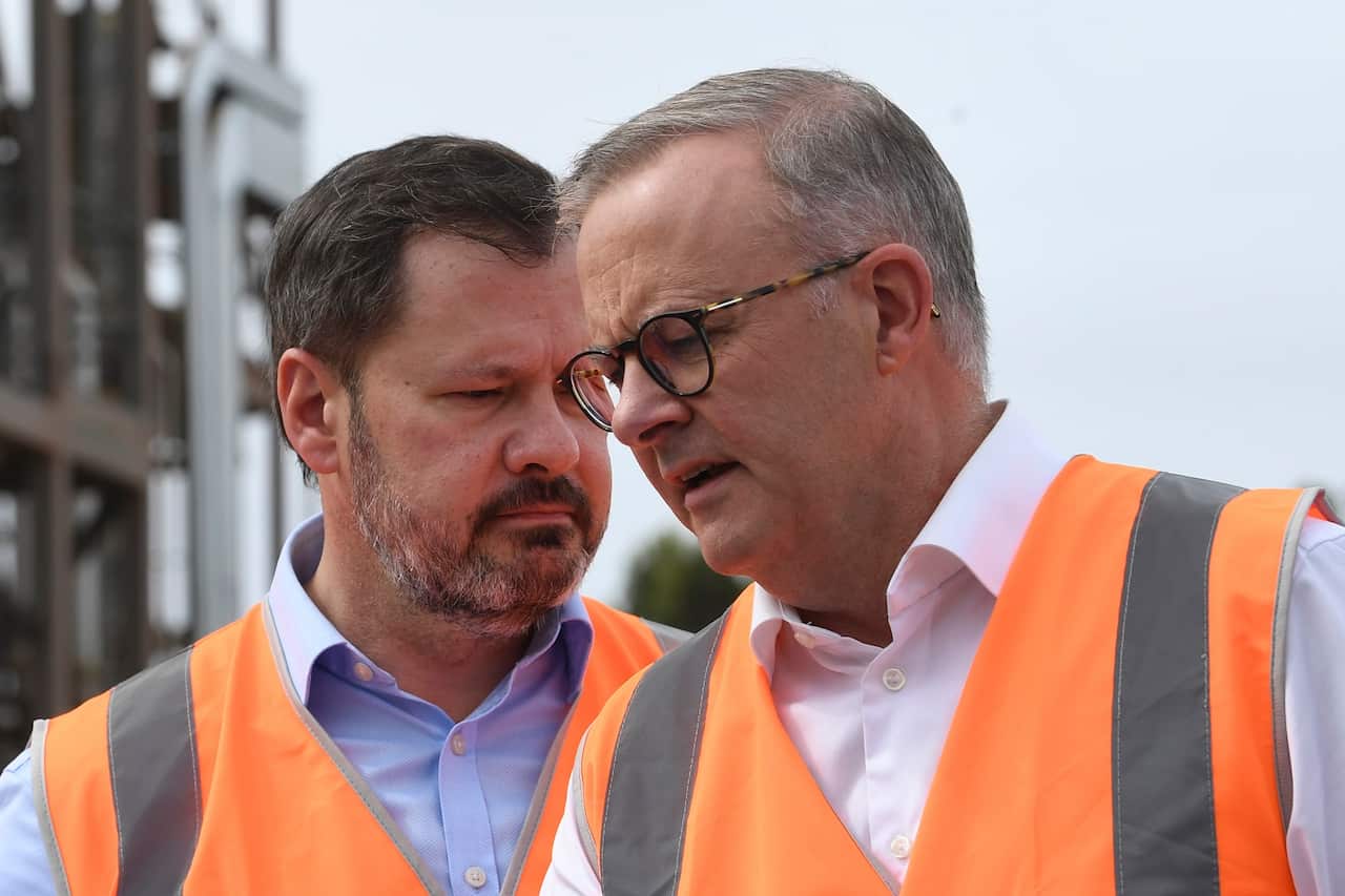 Australian Opposition Leader Anthony Albanese and Shadow Industry and Innovation Minister Ed Husic (right) speak to the media during a press conference after touring the Northern Oil Refinery on Day 32 of the 2022 federal election campaign, in Gladstone
