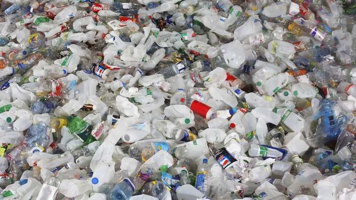 Pile of used plastic bottles full frame