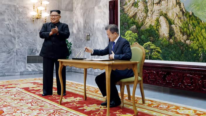 (R-L) South Korean President Moon Jae-In and North Korean leader Kim Jong Un held a surprise second meeting on the northern side of Panmunjom in the DMZ (AAP)