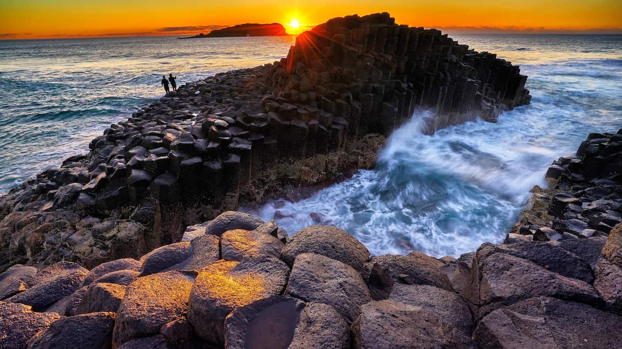 Rock fishing sunset