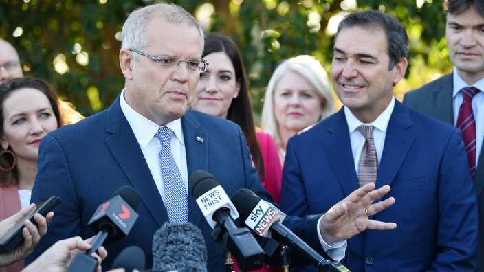 Prime Minister Scott Morrison is seen with South Australian Premier Steven Marshall at Urrbrae Education Centre in Netherby, Adelaide, Tuesday March 19, 2019. 