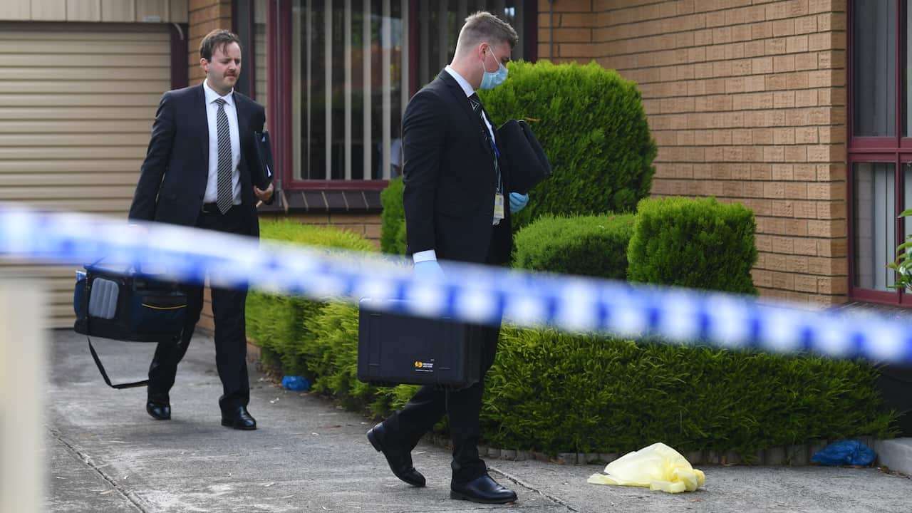 Victorian Police detectives arrive to a crime scene at a property in Tullamarine, Melbourne, Friday, January 15, 2021. A man is speaking with homicide detectives after four people were found dead at a home in Melbourne's northwest.