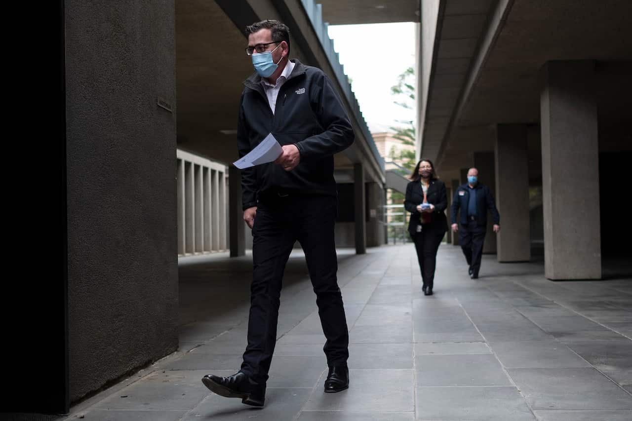 Victorian Premier Daniel Andrews arrives to speak to the media during a press conference in Melbourne, Sunday, July 26, 2020. (AAP Image/Daniel Pockett) NO ARCHIVING