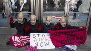 Protesters in Washington DC ahead of the arrival of Israeli PM Binyamin Netanyahu.
