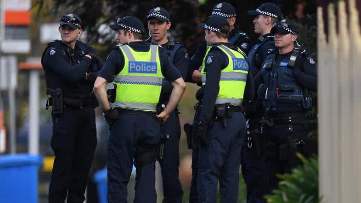 Police are seen at the Buckingham Serviced Apartments in Brighton