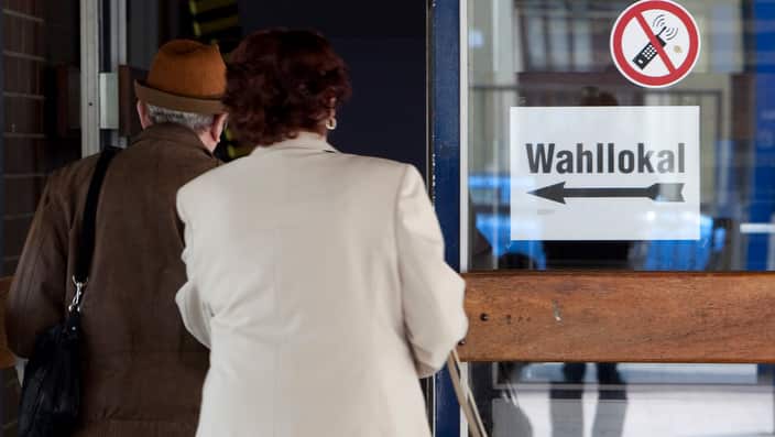 An elderly couple walks into a polling station in Herne, western Germany, on Sunday, May 9, 2010. (AAP Images/apn Photo/Joerg Sarbac)