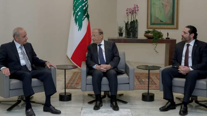 photo shows Lebanese President Michel Aoun (C) meets with Lebanese Parliament Speaker Nabih Berri (L) and Prime Minister Saad al-Hariri (R)