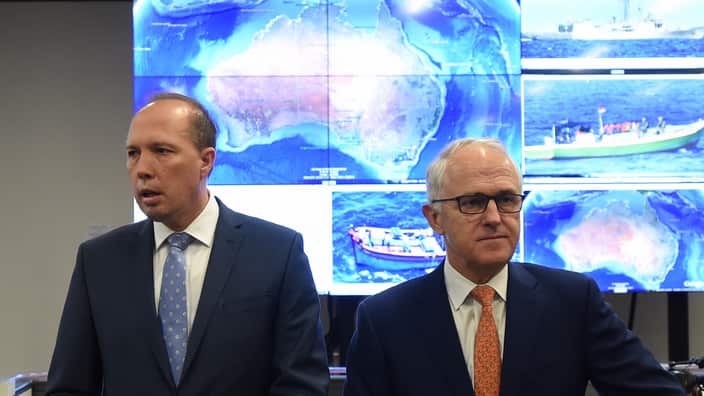 Australia's Prime Minister Malcolm Turnbull and Australia's Immigration Minister Peter Dutton