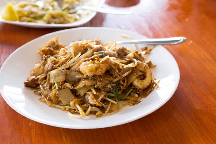 The restaurant serves two types of char kway teow. This version is the Penang style, made with flat rice noodles. (Audrey Bourget)