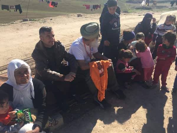 Khalsa Aid founder Ravi Singh with Yazidi refugees