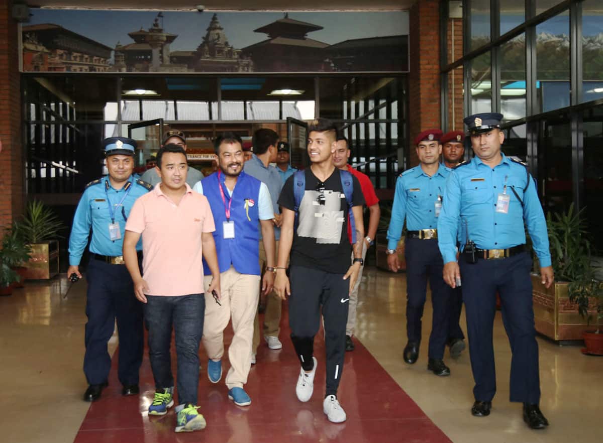 Nepali cricketer Sandeep Lamichhane speaking to journalists at Kathmandu airport after returning from his IPL debut in India.