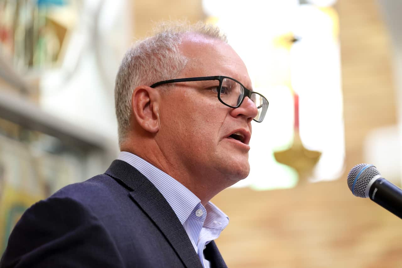 Prime Minister Scott Morrison speaks during a vigil at St Andrews Ukrainian Church in Sydney, Sunday, February 27, 2022. (AAP Image/Brendon Thorne) NO ARCHIVING