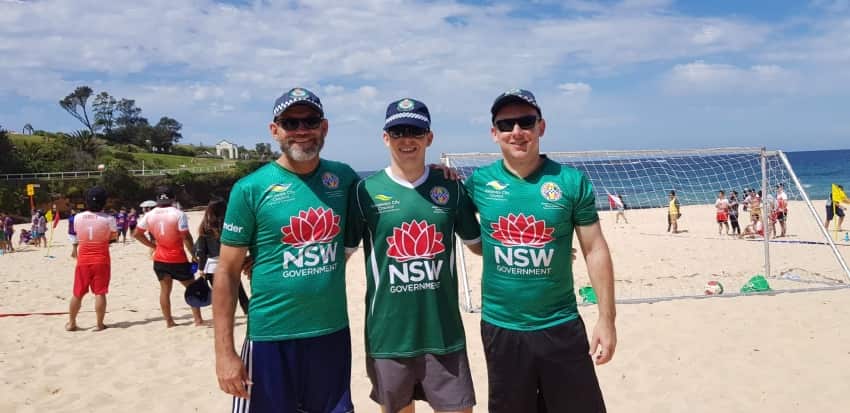 Police playing beach soccer