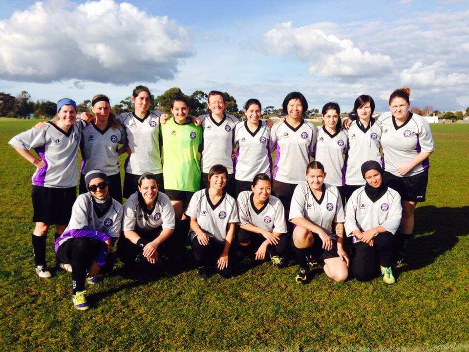 Dr Nasya Bahfen (front row, left) and the Maribyrnong Swifts smile for the camera.